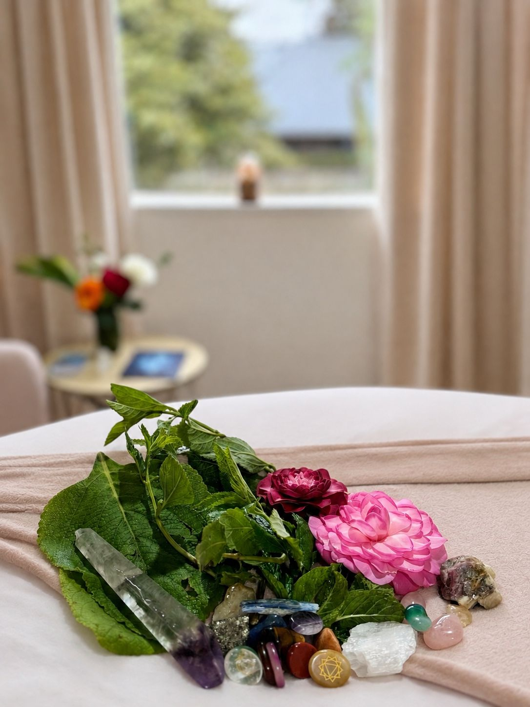 Crystals, herbs and flowers prepared for an energetic holistic session